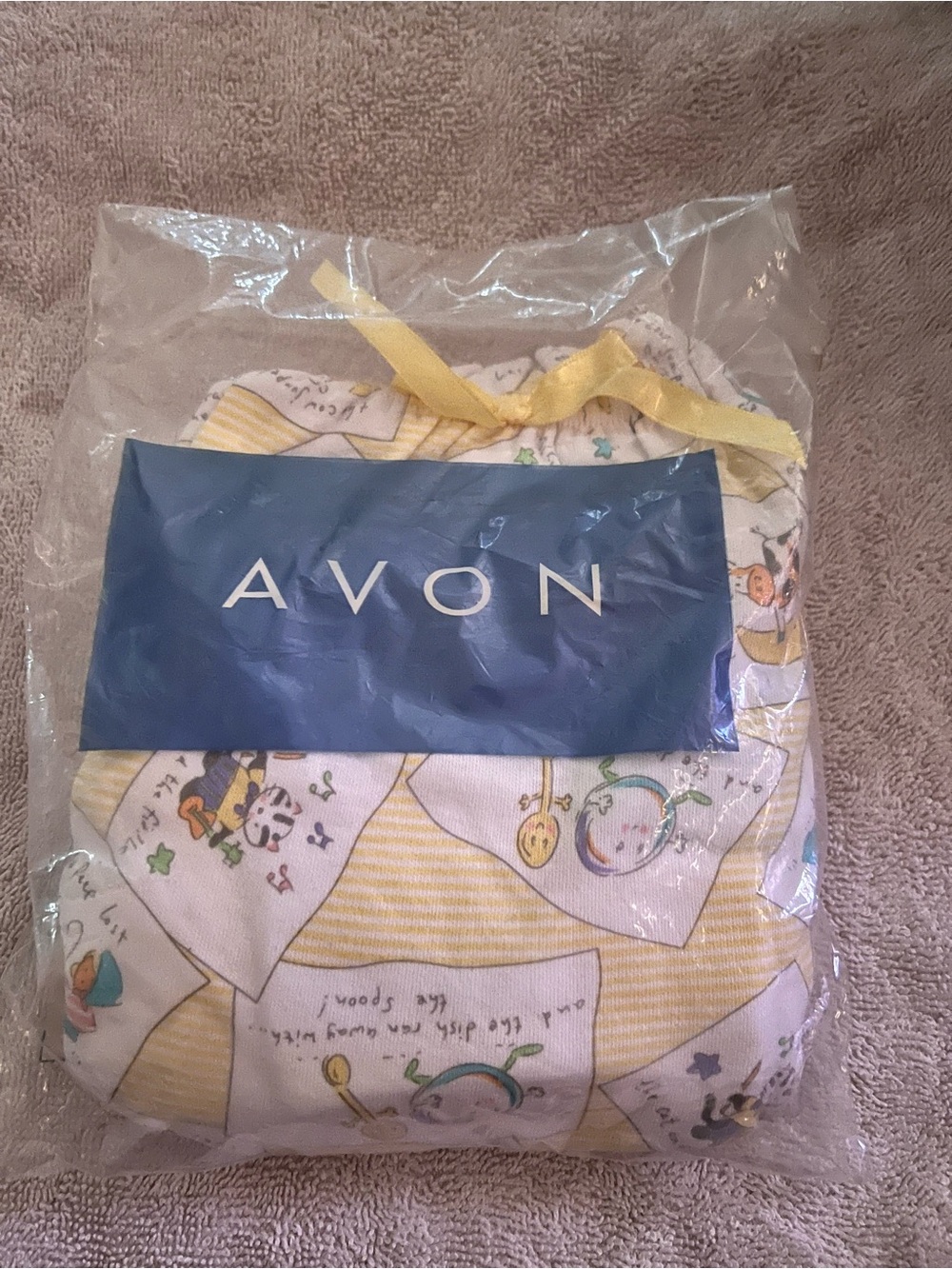 AVON strip Creepers in a Bag, Yellow Printed characters,